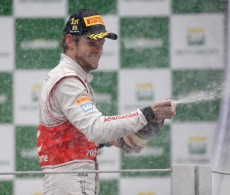 Button wins in Brazil