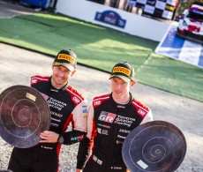 2021 WRC - Rally Finland - Scott Martin (left) and Elfyn Evans at the final event podium