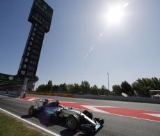 HAMILTON TAKES OVER AT TOP IN SPAIN