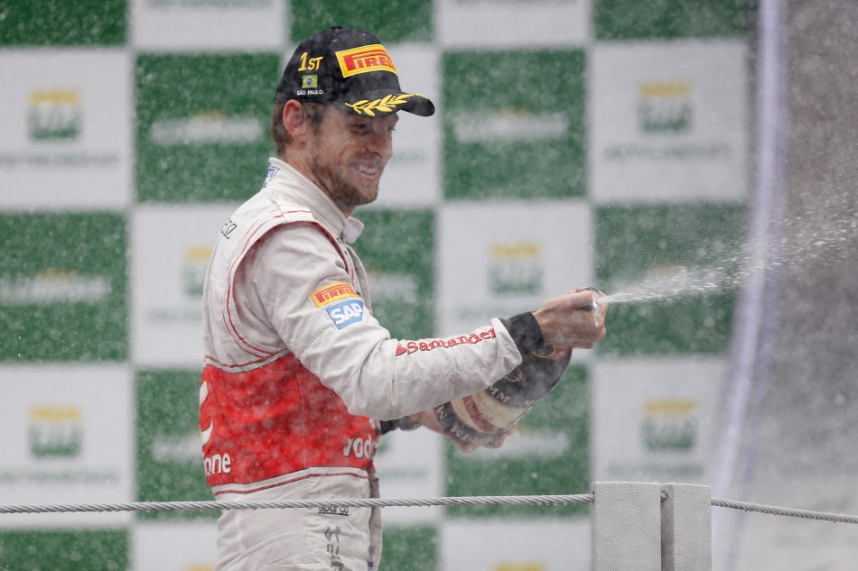 Button wins in Brazil